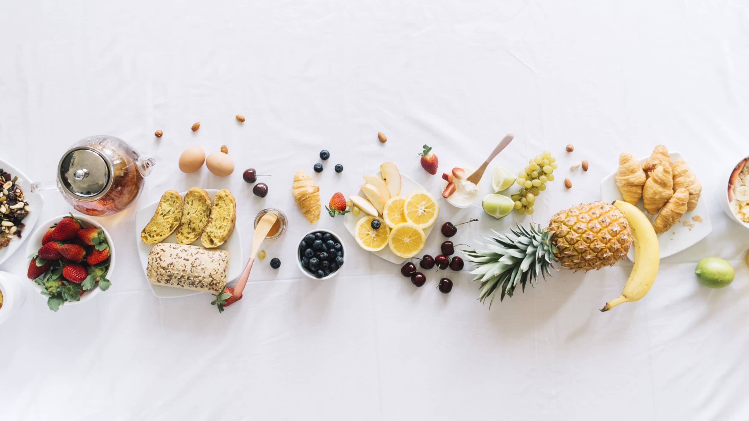 elevated-view-healthy-breakfast-white-background